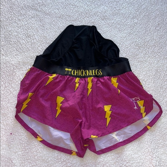 Vibrant Purple and Yellow Athletic Shorts with Lightning Pattern - Picture 9 of 9